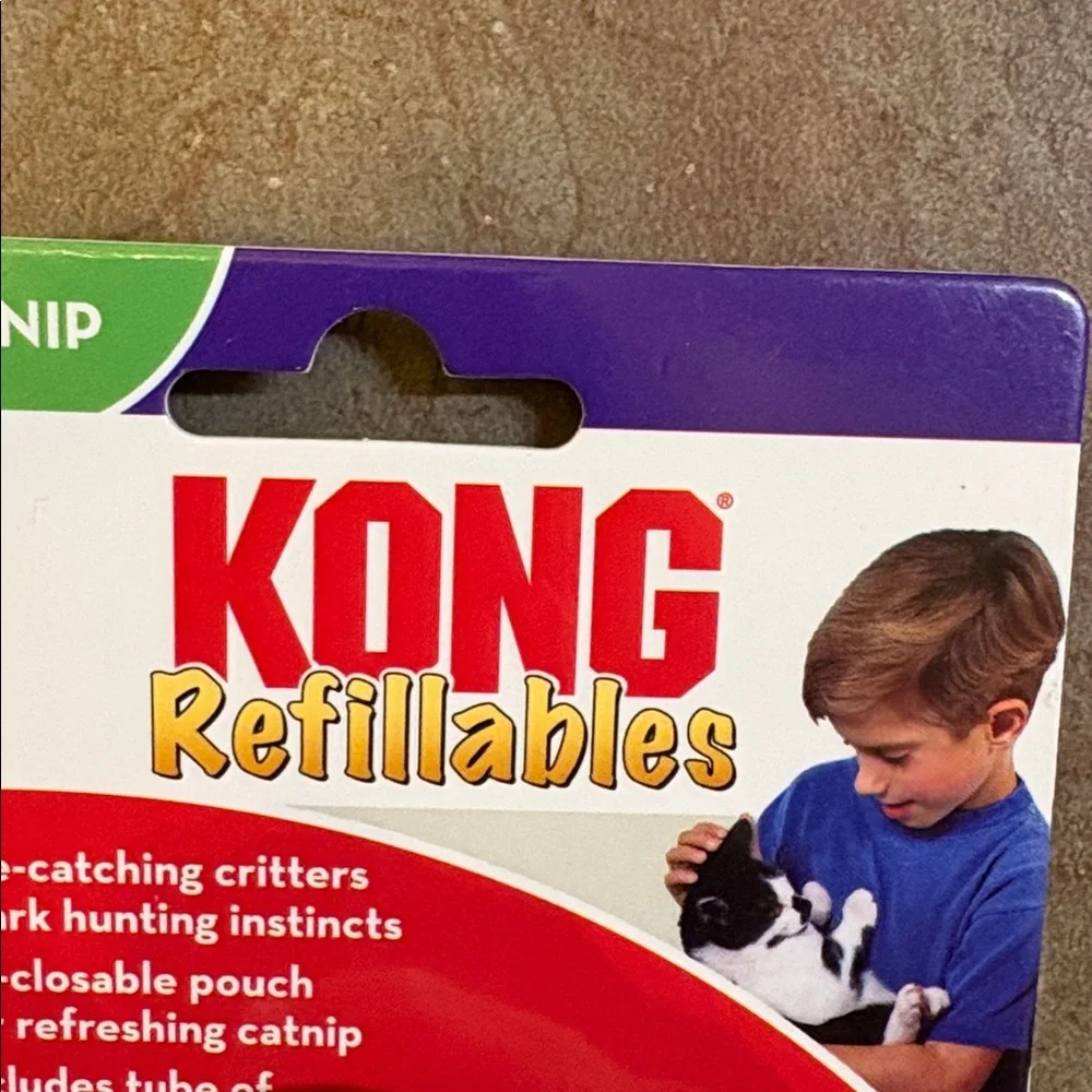 One catnip KONG refillables; Along with various cat toys. See pictures.